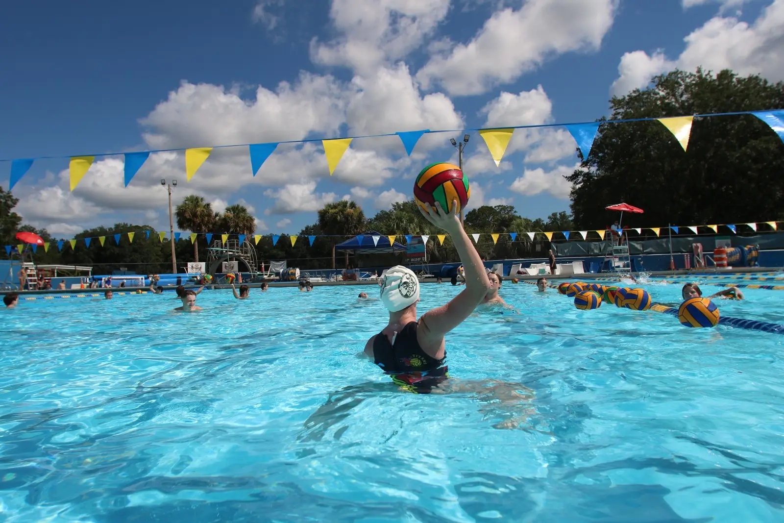 A shot under summer clouds and pennant flags at the 2024 summer event