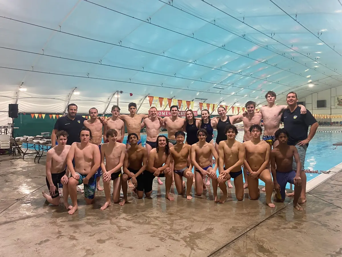Athletes and coaches together on the deck at the 2022 Memphis Thanksgiving clinic