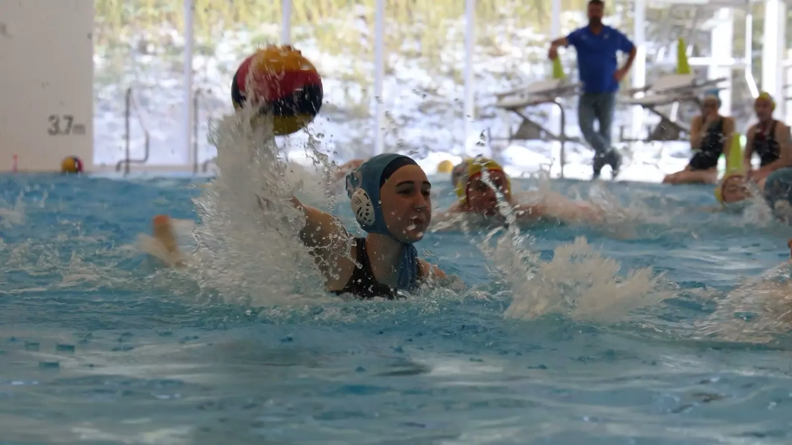 An athlete shooting through a splash at the Surrey clinic