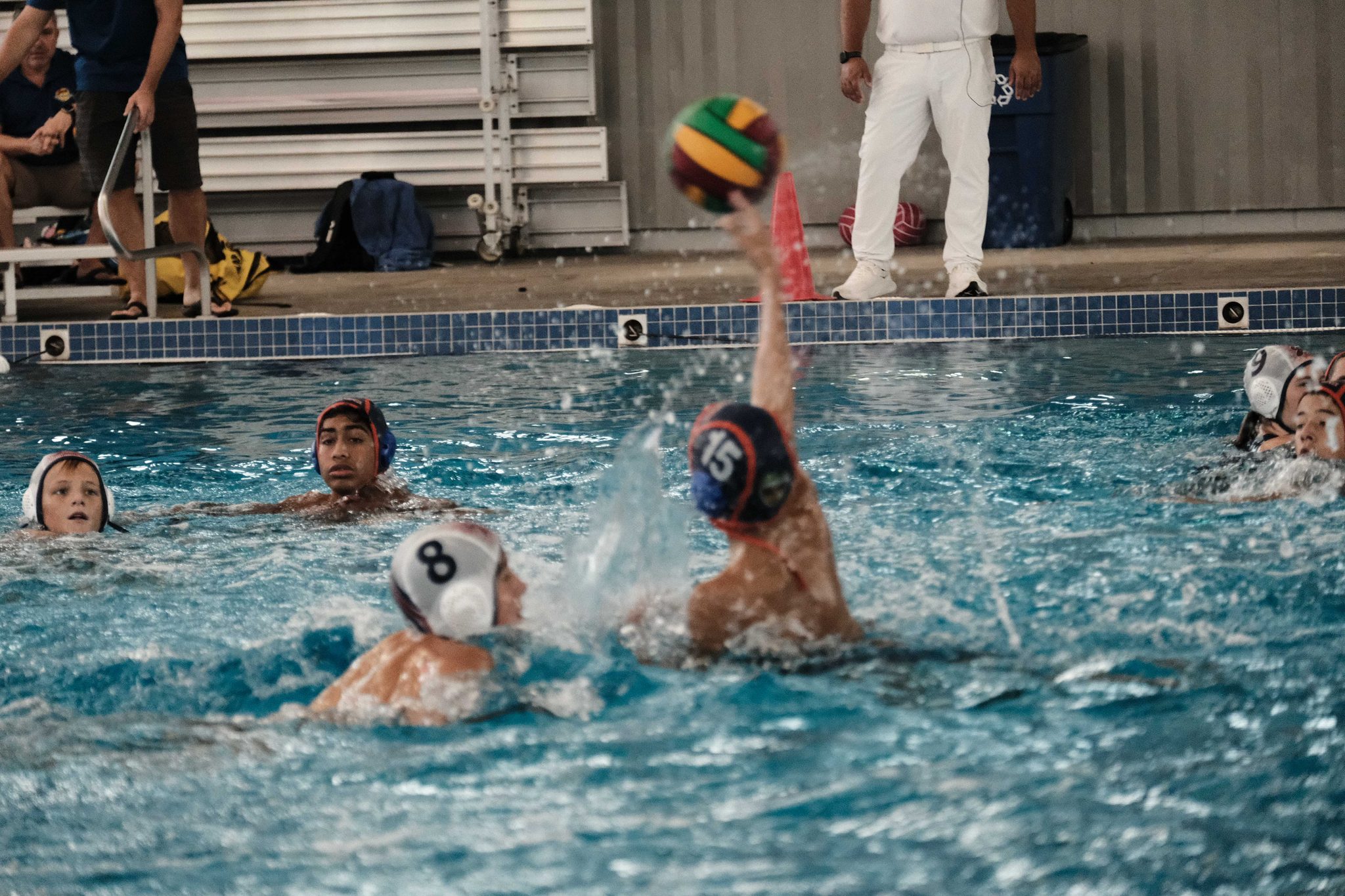 An athlete rising to shoot